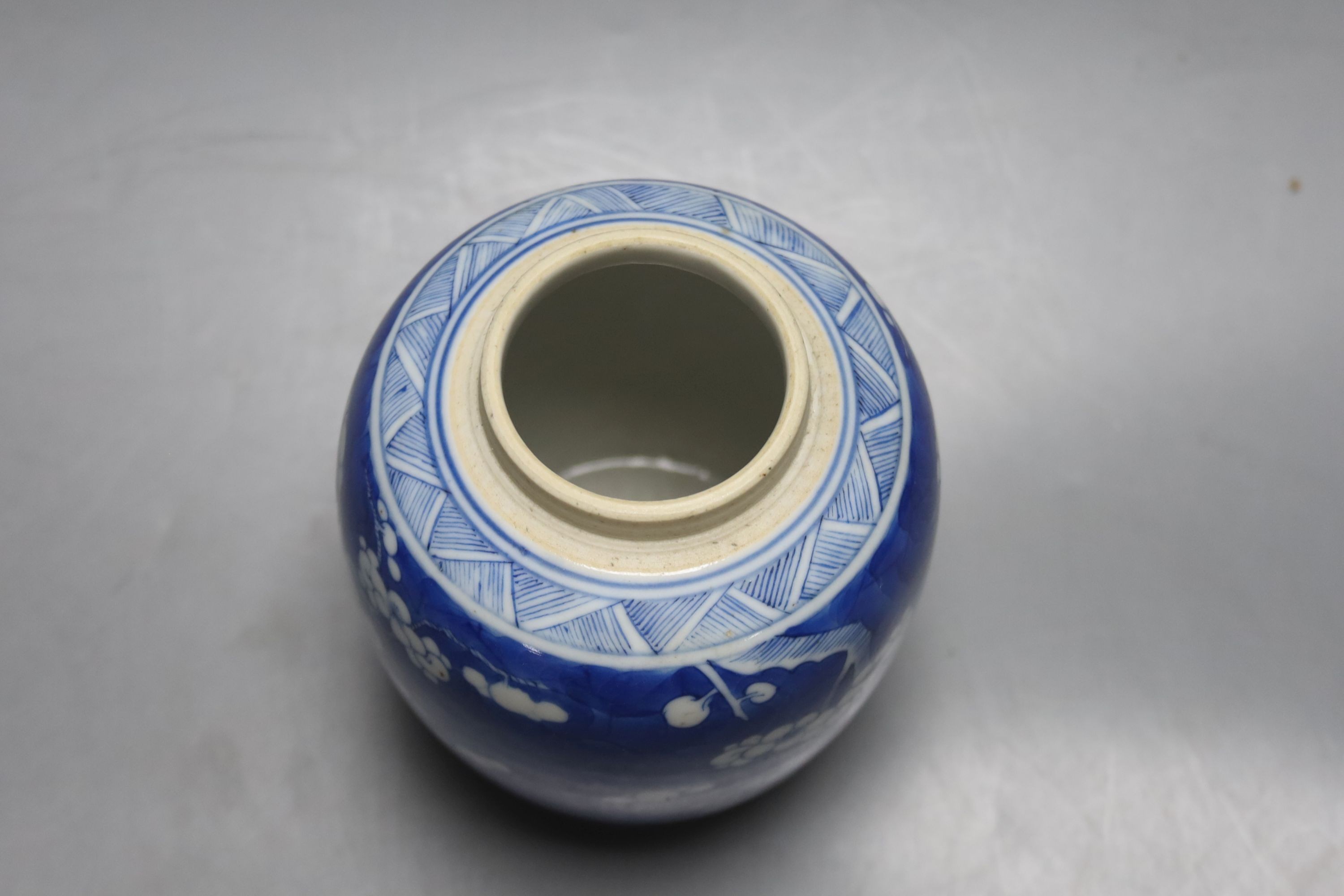 A 19th century Chinese blue and white prunus jar 13.5cm